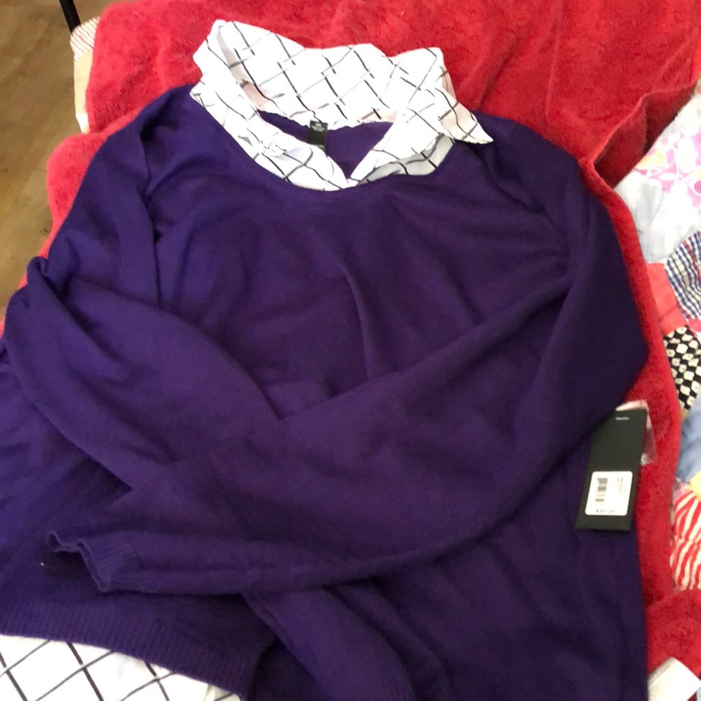 Purple/black sweater NWT.